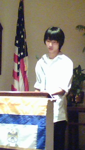 Mr. Ho presents his winning essay at the Fairfax Resolves' March meeting