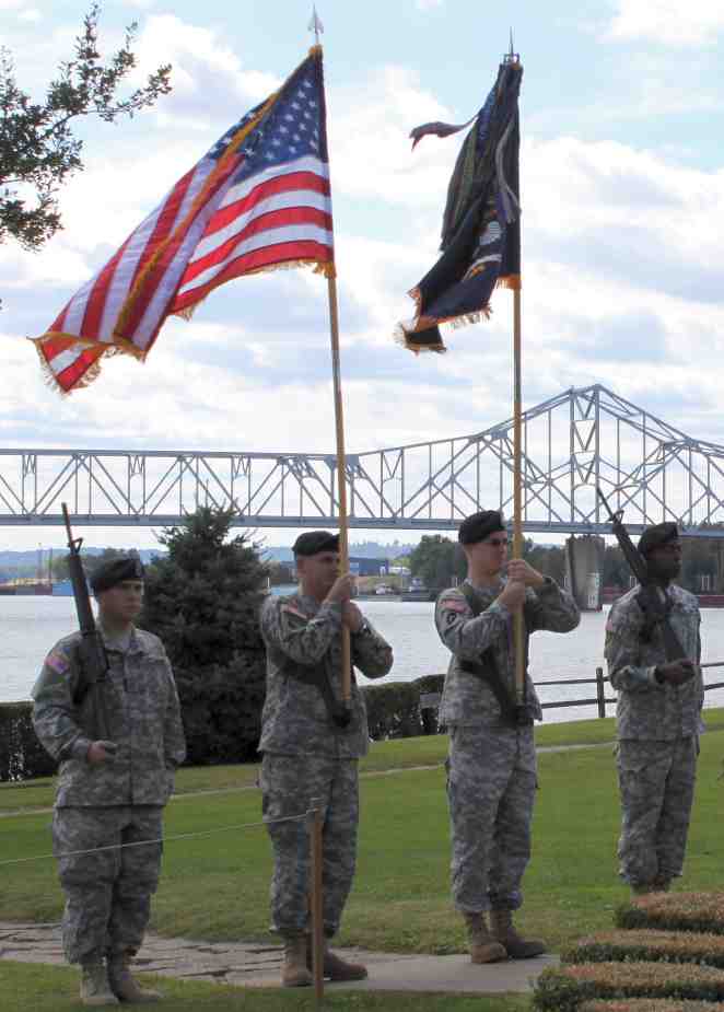 The Virginia National Guard Colorguard. The Silver Memorial Bridge can be seen crossing the Ohio River in the background.