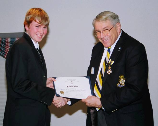 Runner up Nathan Cvrk recieves his certificate from Second Vice President John Jack Sweeney.
