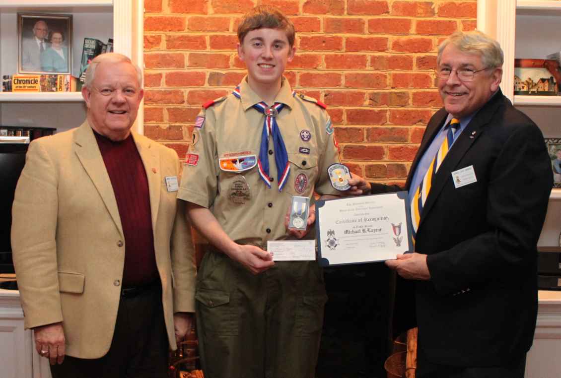 Fairfax Resolves presented Michael Lazear with the Eagle Scout medal, uniform patch, certificate, and check for $100. Larry McKinley (left) and President Jack Sweeney make the presentation. Darrin Schmidt (not pictured) also attended.